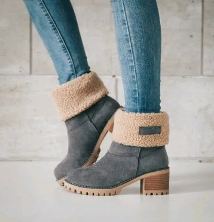 Women's suede mid-calf snow boots with a thick low heel and round toe in various colours.