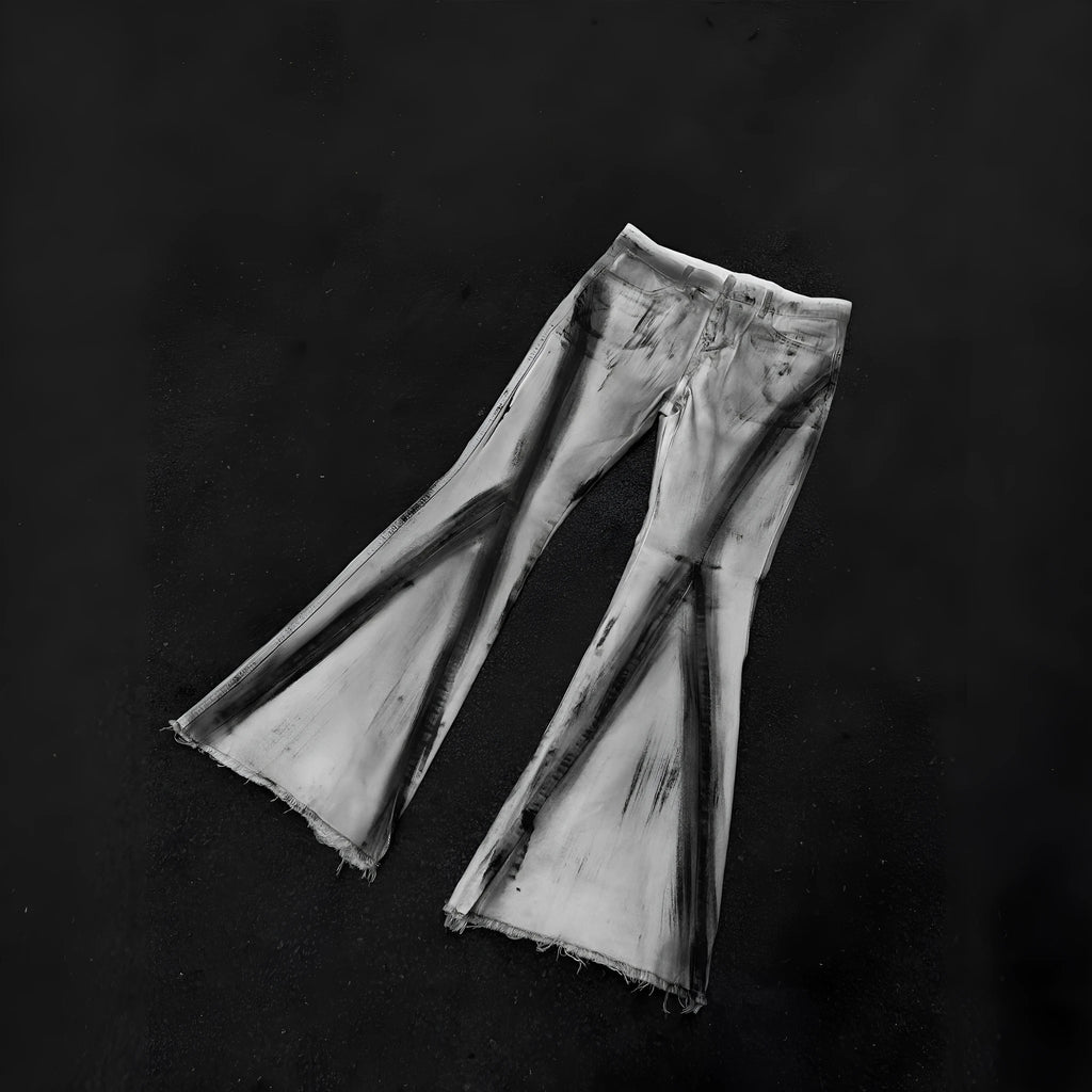 White heavy rough selvedge denim jeans with a black ribbon gradient colour effect, showing mid waist and zip fly.