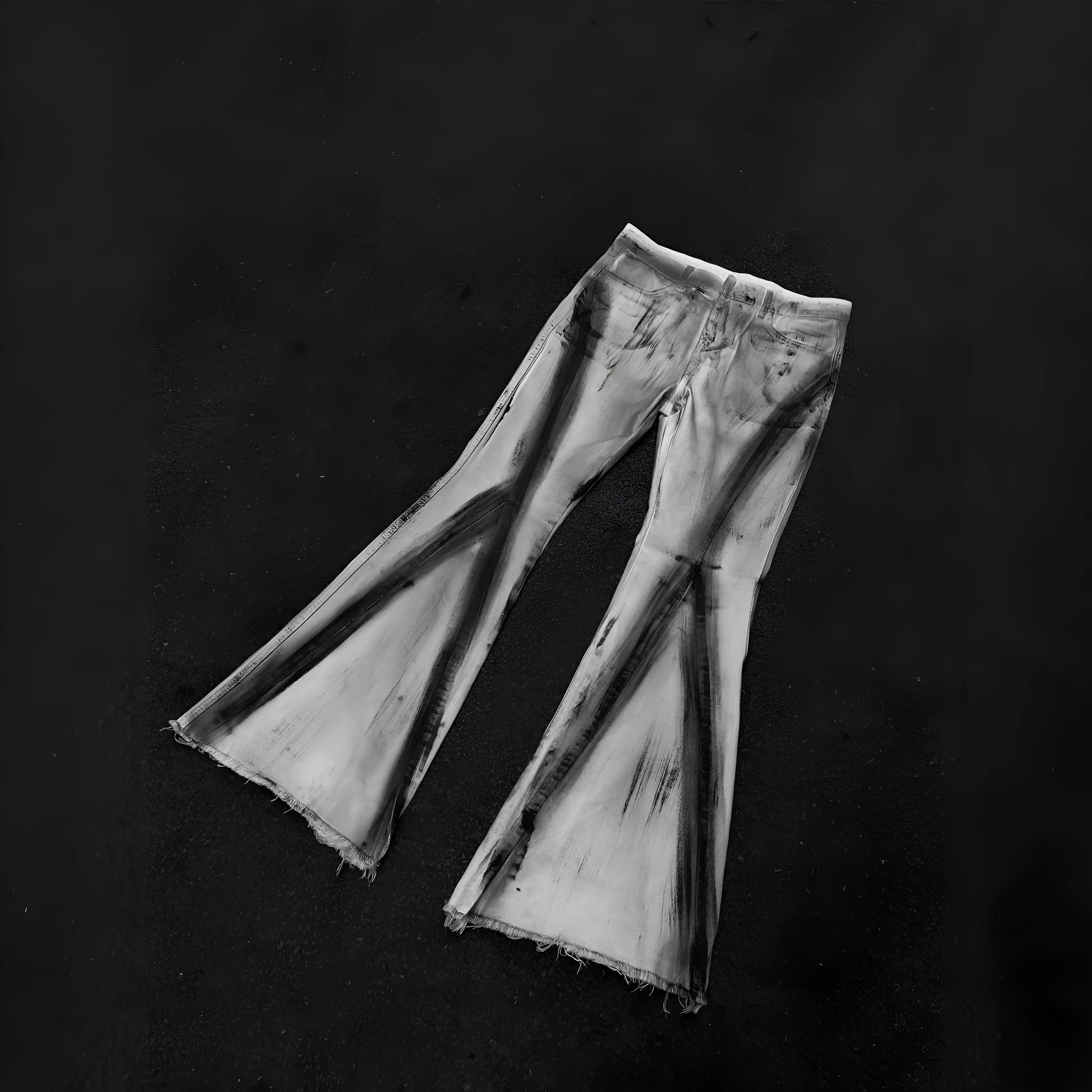 White heavy rough selvedge denim jeans with a black ribbon gradient colour effect, showing mid waist and zip fly.