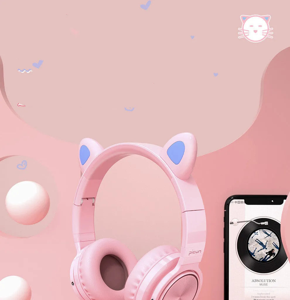Pink white Bluetooth wireless over-ear headphones with braided cable and built-in microphone