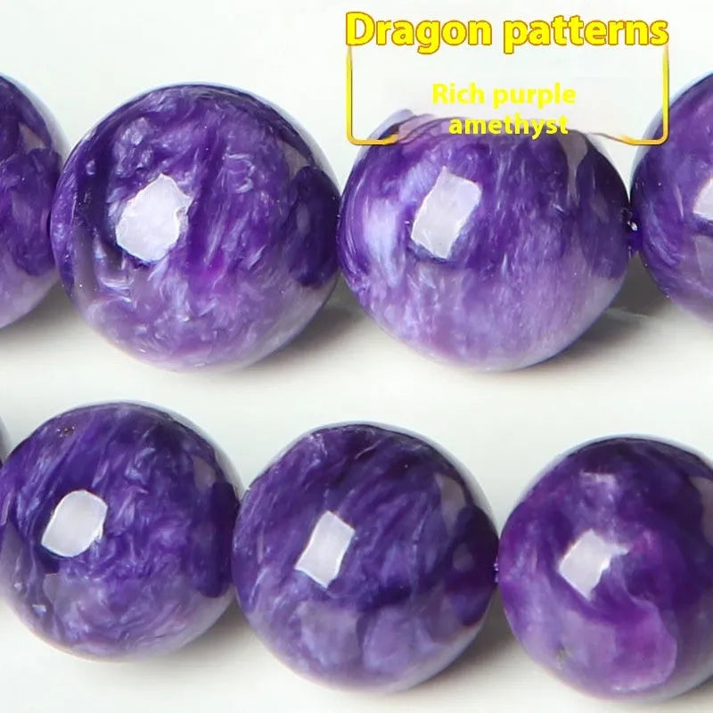 Natural purple charoite crystal bracelet with platinum details, showing different bead size options.