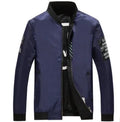 Men's reversible flight jacket in a fitted cut with a stripe pattern, shown in black, blue, and green colour options.