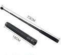 Black retractable selfie stick with Bluetooth remote, extended to full length with a smartphone attached.