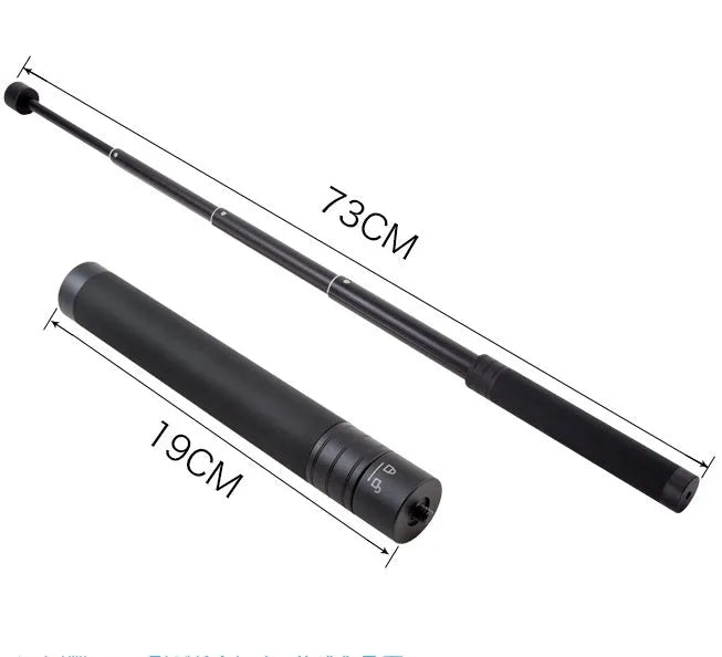Black retractable selfie stick with Bluetooth remote, extended to full length with a smartphone attached.