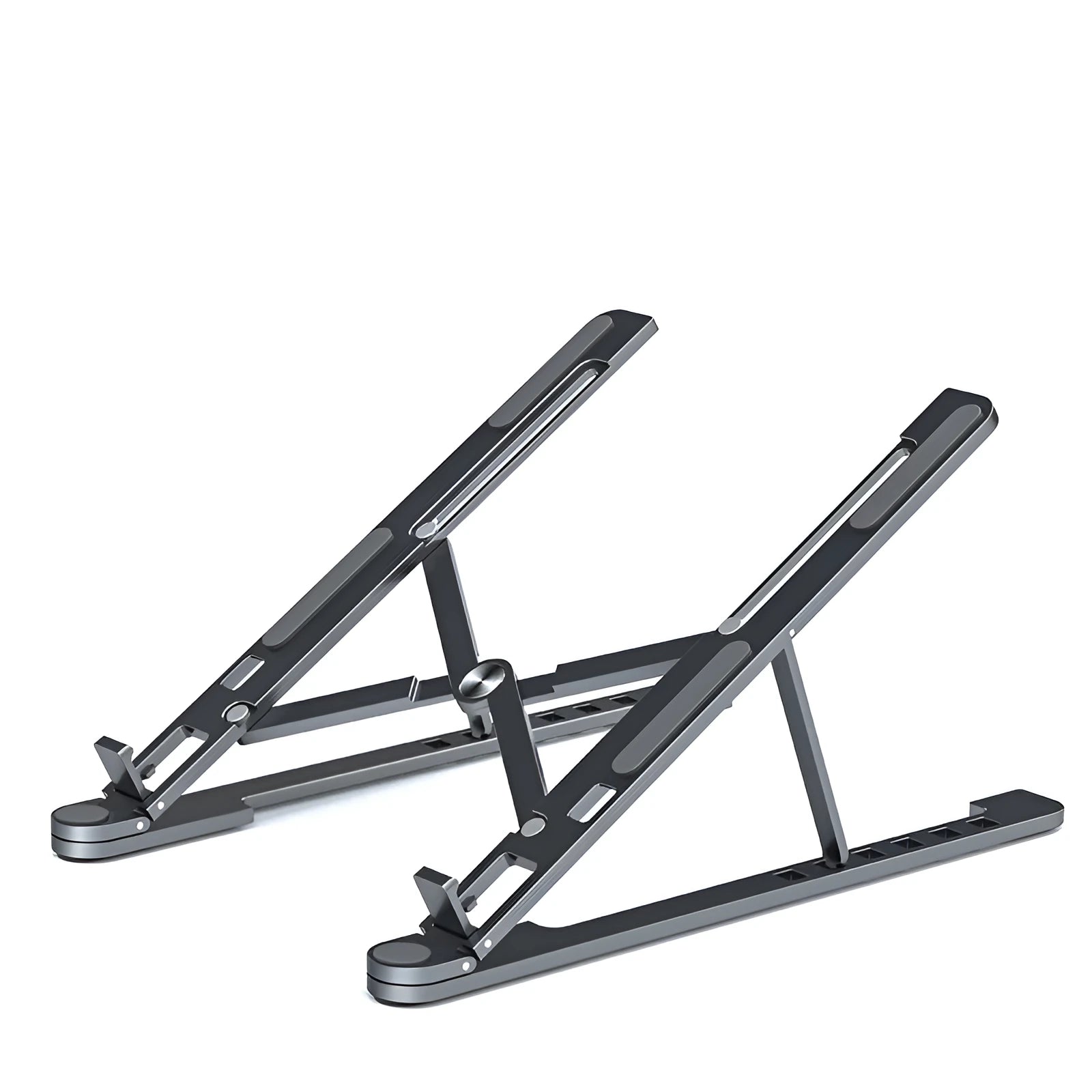 A folded silver aluminium laptop stand next to an open laptop, showing its thin profile and adjustable angle mechanism.