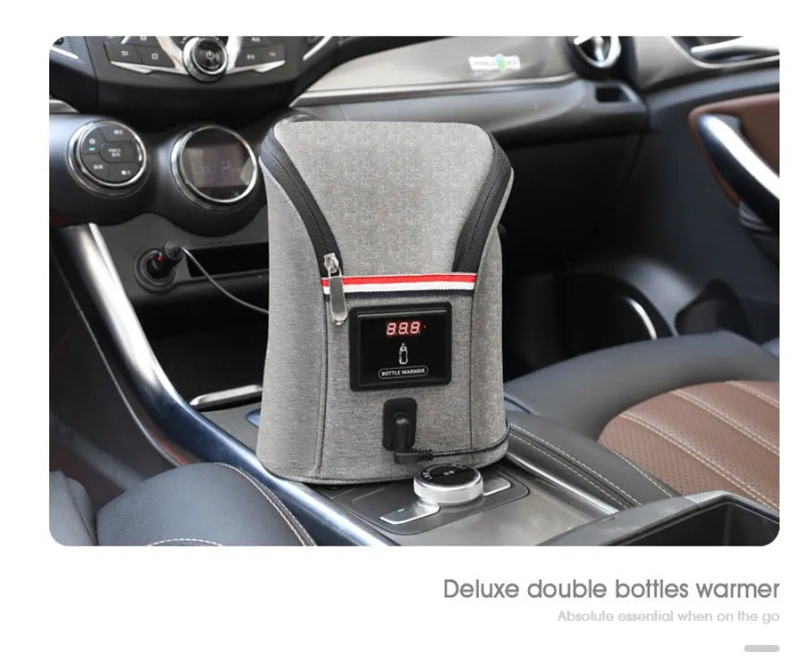 Grey portable baby bottle warmer with digital display for car travel use