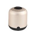 Hieha XQ11 cylinder-shaped mini Bluetooth speaker in silver colour on a table