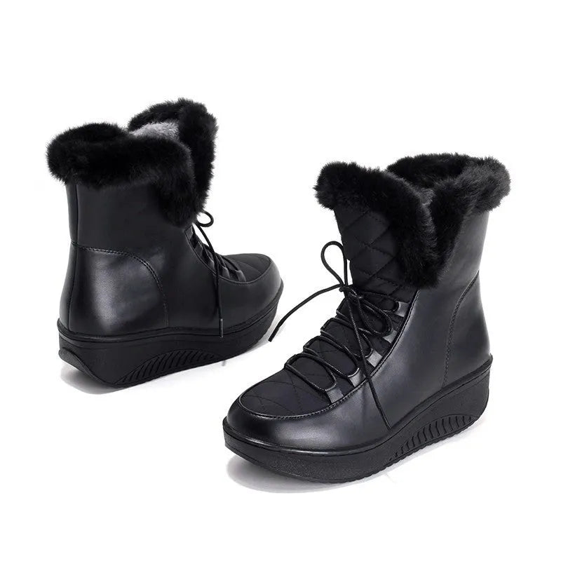Black women's winter boots with lace-up closure and platform sole