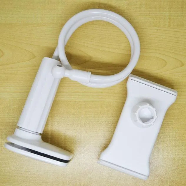 Black bedside oversize flat panel mobile phone holder with adjustable long arm on table