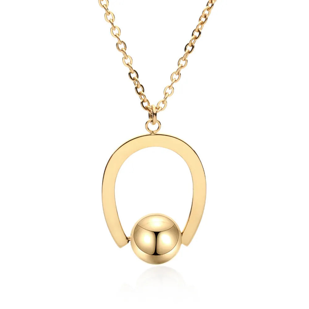Stainless steel geometric pendant necklace on cross chain in gold or silver finish