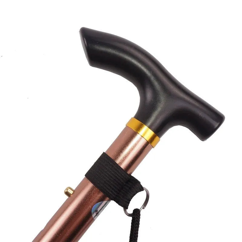 Aluminum folding walking cane extended to show adjustable shaft and rubber tip