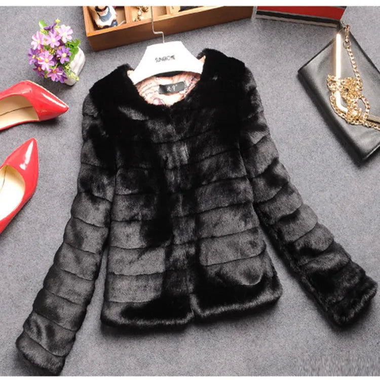 Women's short-length faux fur jumper in beige, shown with regular sleeves and a textured rabbit fur-style pile.