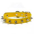 A spiked dog collar made of black PU leather with silver metal studs and an alloy buckle.