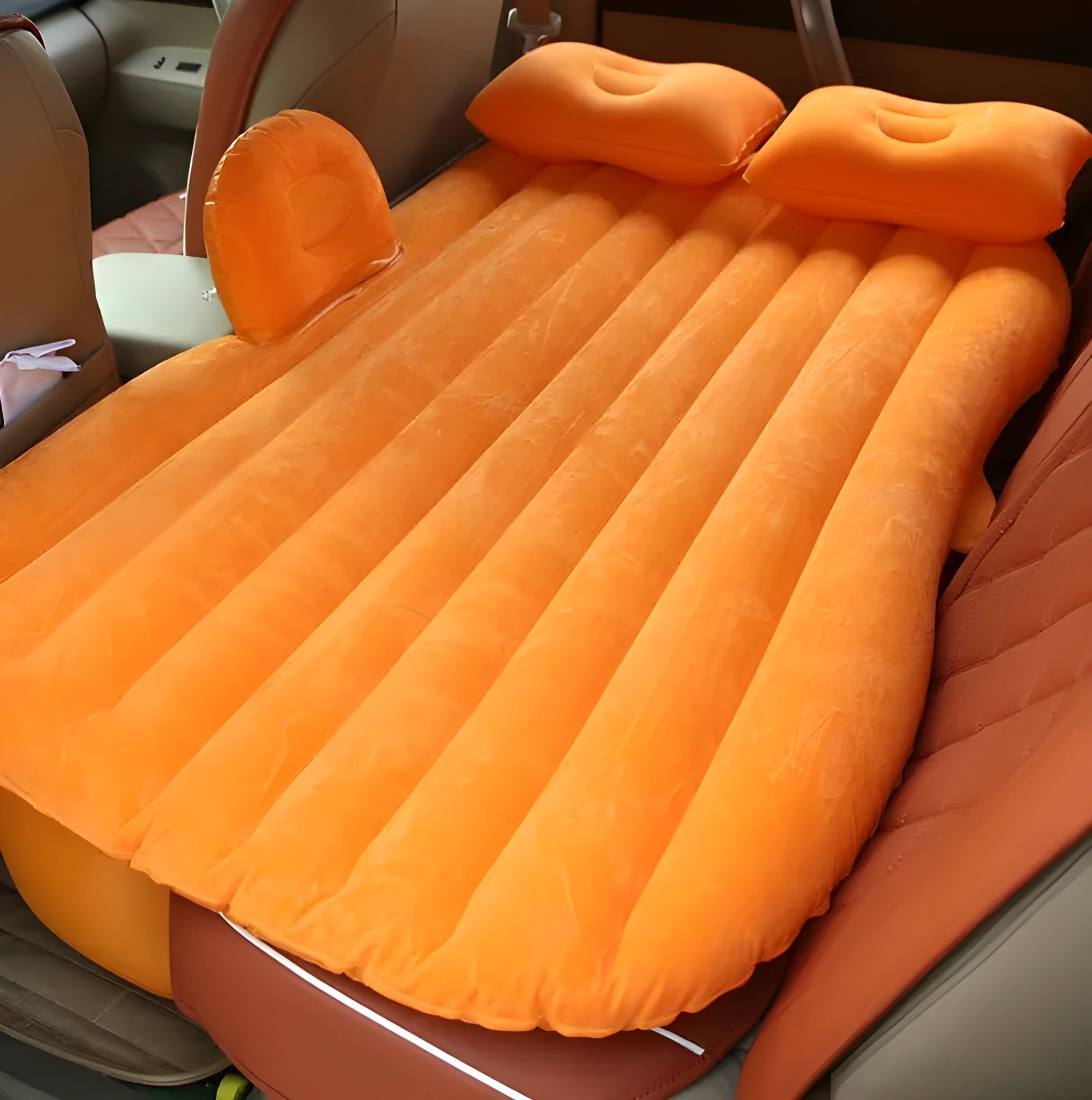 Thick flocking inflatable car air bed set with pump and pillows for five-seater vehicles.