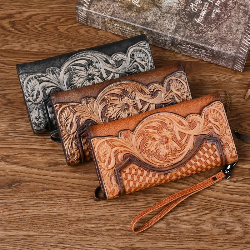 Women's brown tri-fold cowhide wallet with embossed floral pattern, shown open and closed.