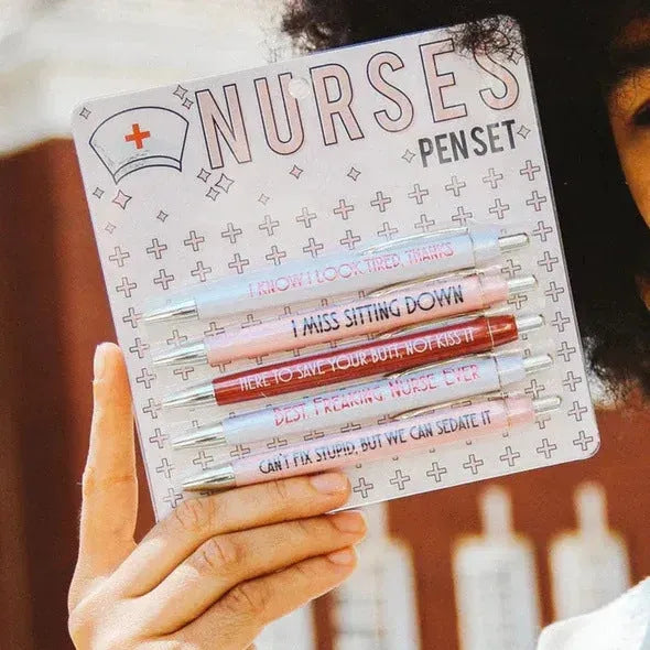 Set of five blue nurse-themed retractable ballpoint pens with plastic casing.