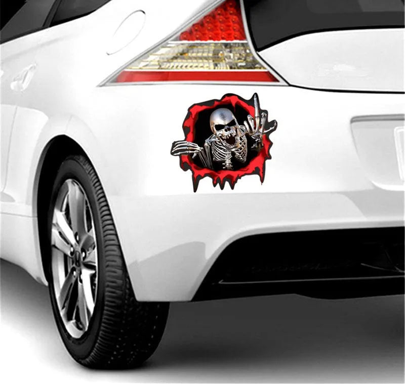 Close-up of a colourful reflective metal skull car sticker with a broken shell pattern, measuring 15cm by 14cm.