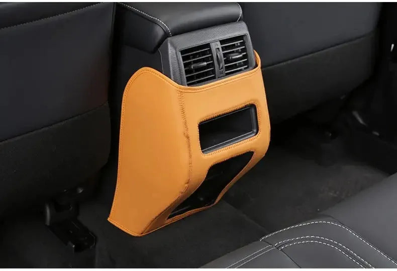 Three black leather anti-kick protection pads for Mitsubishi Outlander seat armrests and centre console