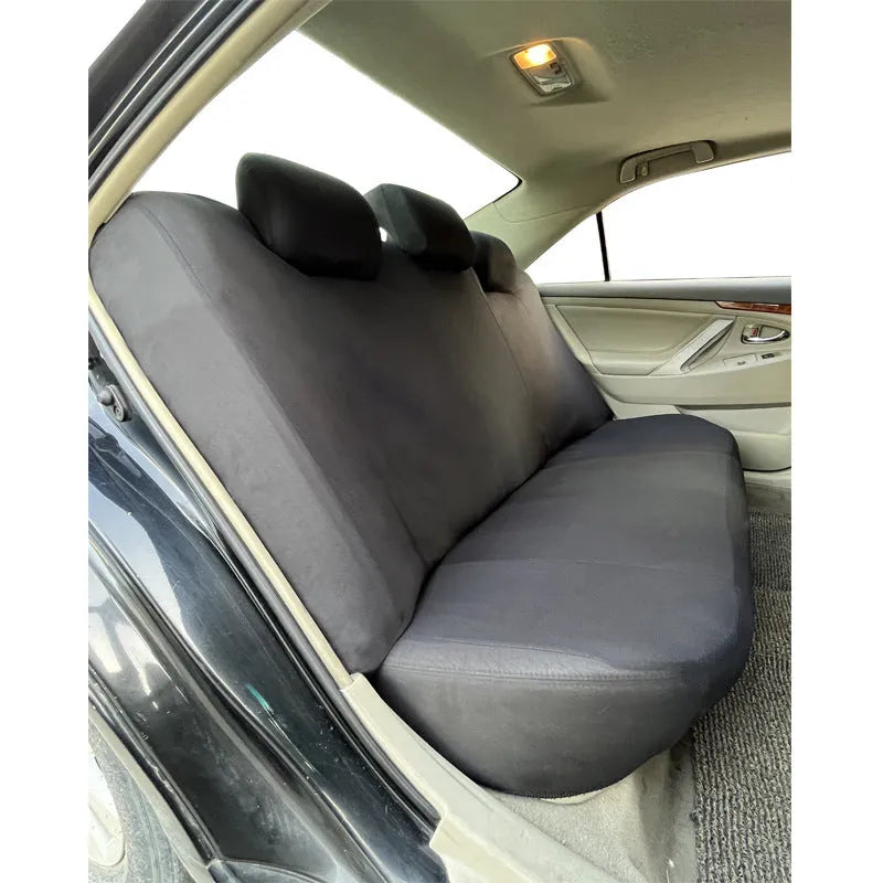 Polyester eyelet fabric universal car seat cover in a choice of colours on a car seat.