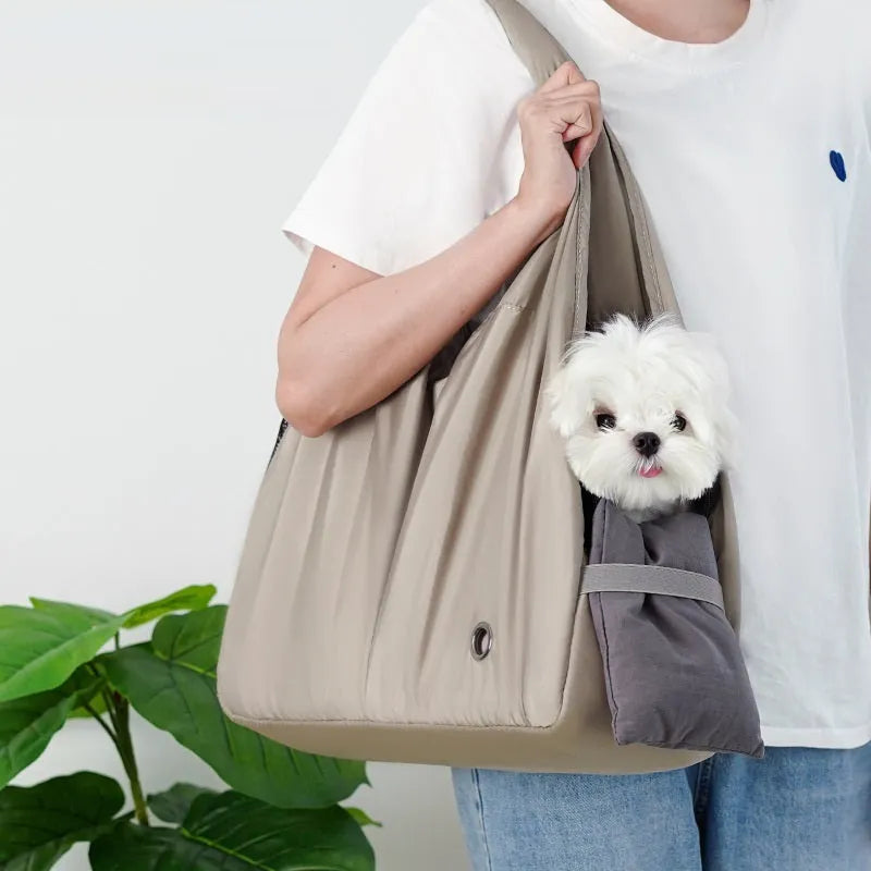Apricot cloth pet carrier handbag showing portable design for pet transport