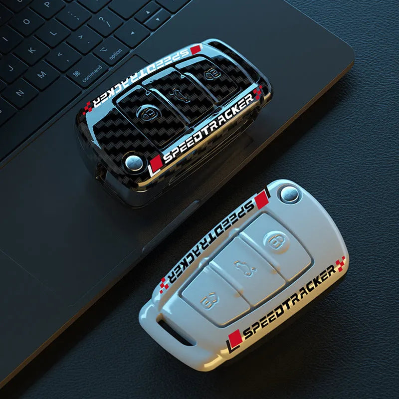 Carbon fibre style car key cover with mirror element in carbon black colour