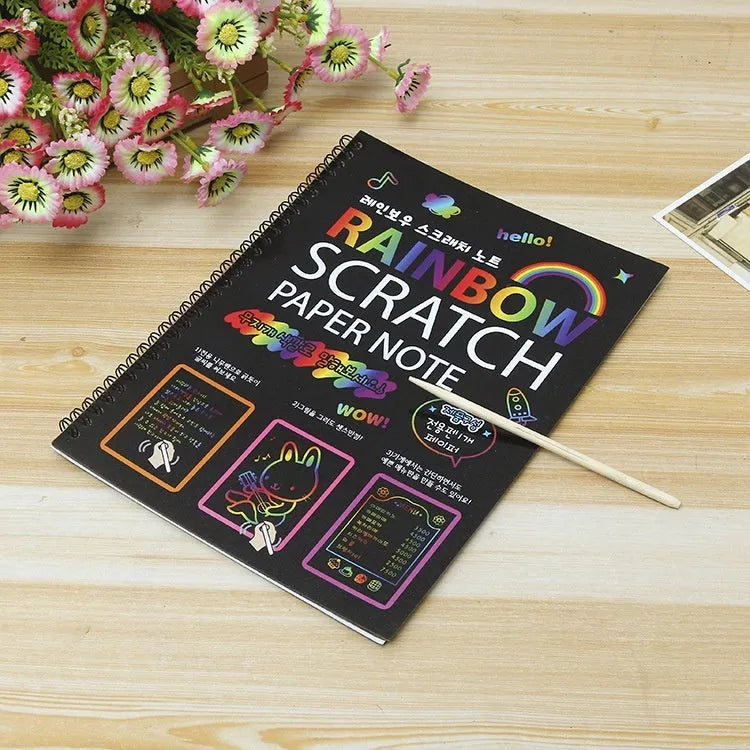 Large children's scratch art paper with colourful design revealed through scraping