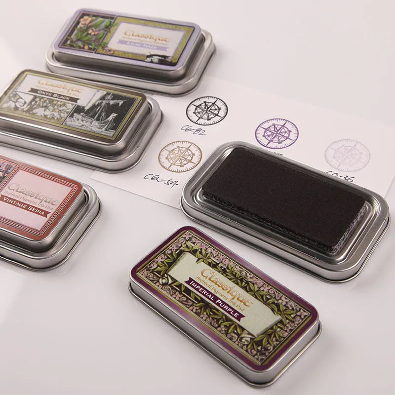 Rectangular quick-dry oily ink pad for rubber stamps in five colour options.