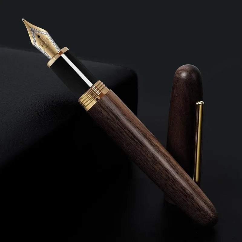 Wooden fountain pen with rotating cap showing natural wood grain