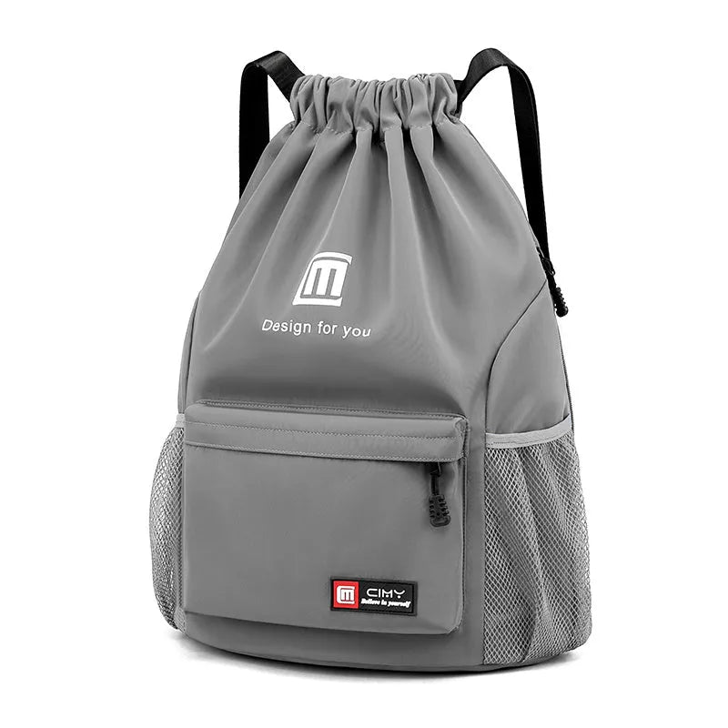 Oxford waterproof drawstring travel backpack in multiple colours showing foldable design and shoulder straps