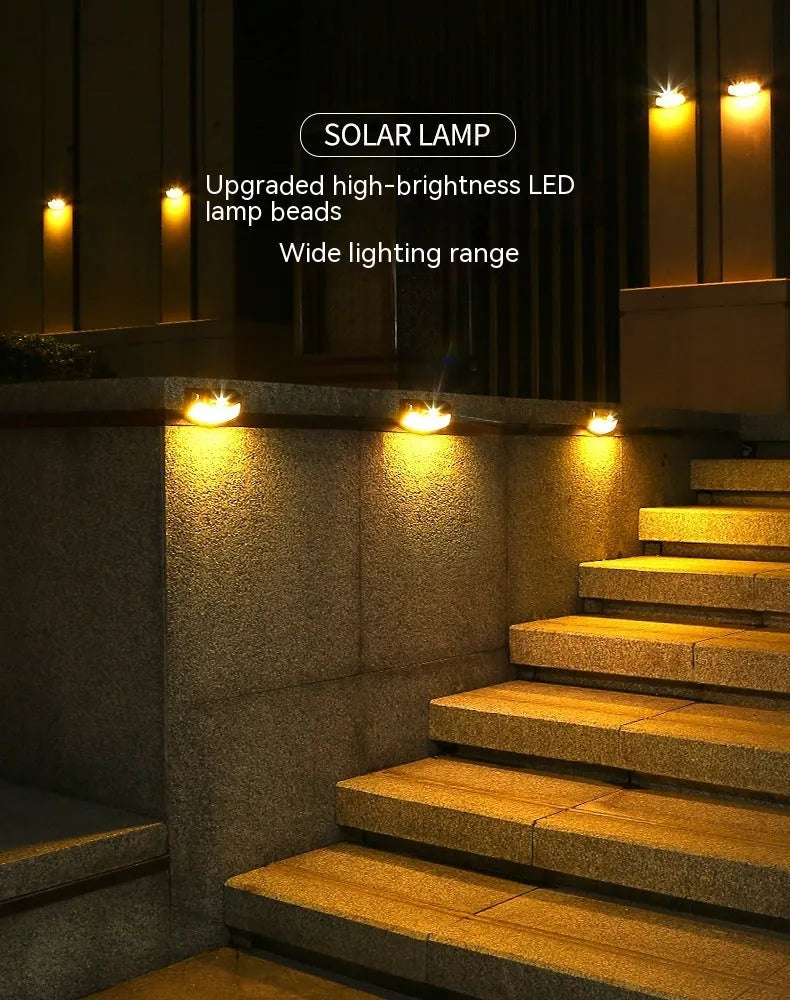 Solar-powered outdoor wall lamp with a smiling face design in warm or white light.