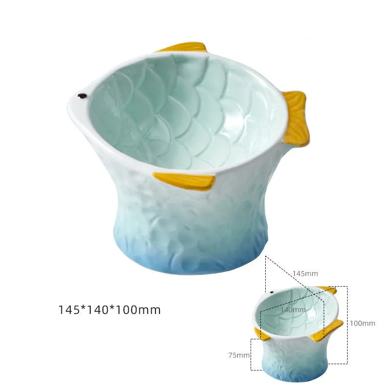 Set of blue ceramic cat feeder bowls in a fish shape with a 15-degree tilt angle.