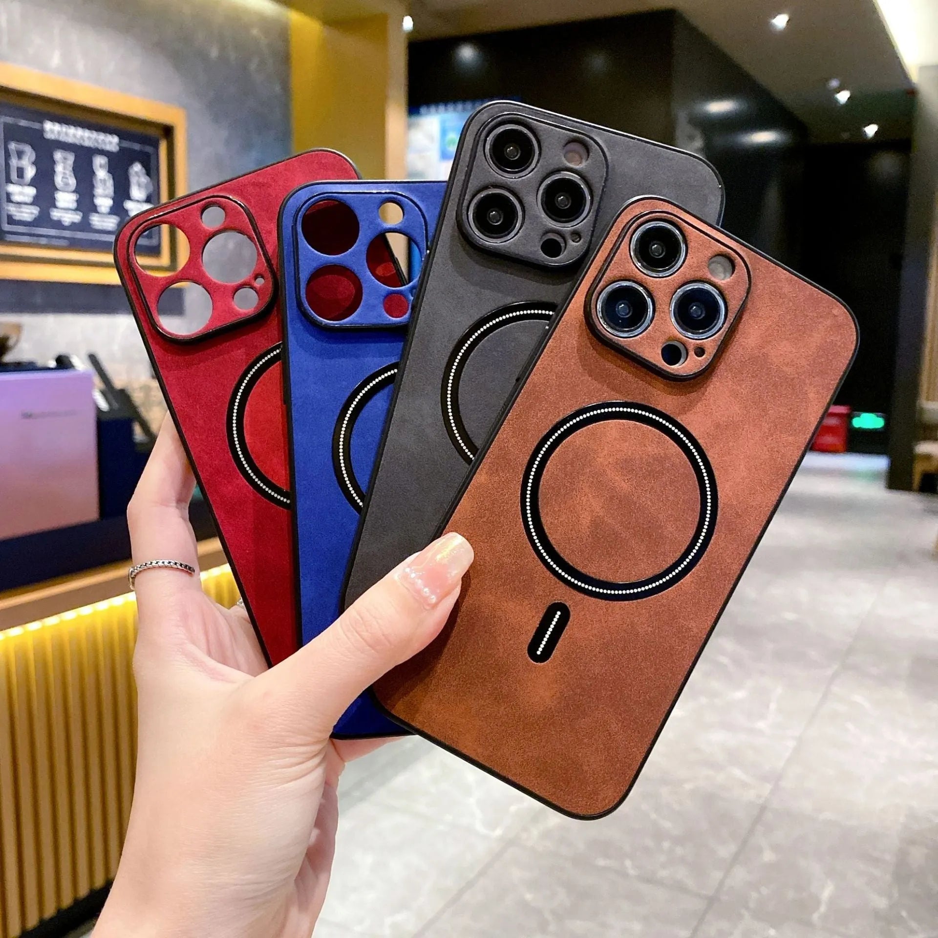Magnetic PC phone case for iPhone in dark gray with camera cutout and raised edges