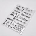 Vintage icon seal calendar stamp in transparent silicone on a crafting surface.