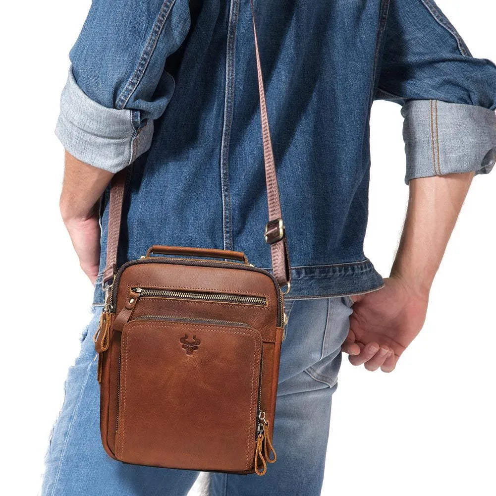 Men's brown genuine leather retro style crossbody bag with sewing line detail.