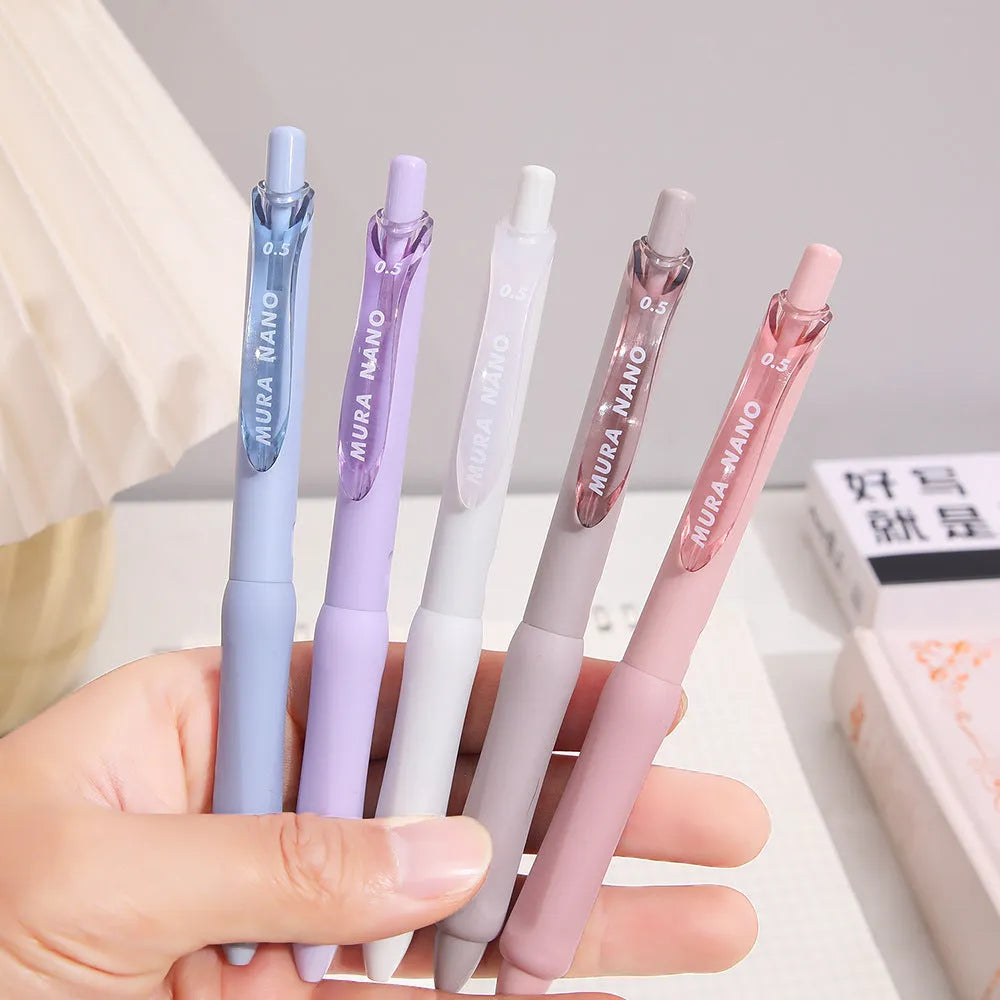 Macaron colour press gel pen with 0.5mm tip showing three refill options: smoked brown, smoked powder, smoked white