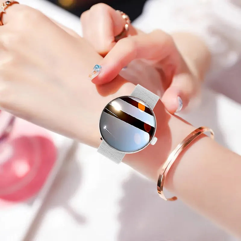 Women's circular smart watch with colour touch screen and metal strap in three colour options