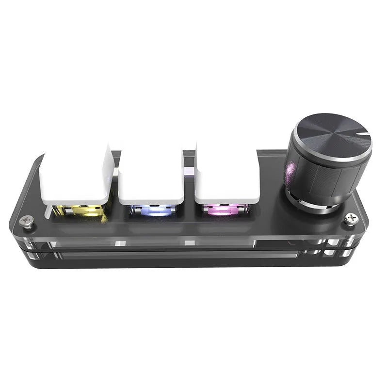 Compact black USB mini keyboard with RGB backlit keys labelled Copy and Paste on a desk.