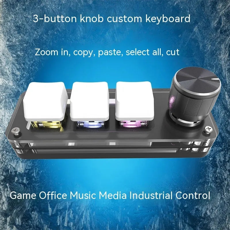 Compact black USB mini keyboard with RGB backlit keys labelled Copy and Paste on a desk.