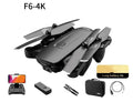 Black folding remote control aircraft with 4K front camera and 1080P bottom camera expanded