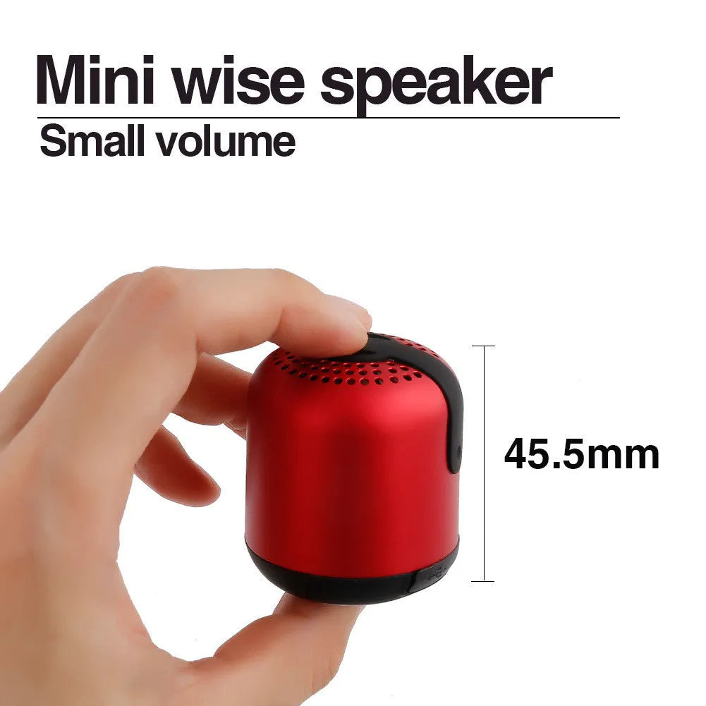 Hieha XQ11 cylinder-shaped mini Bluetooth speaker in silver colour on a table