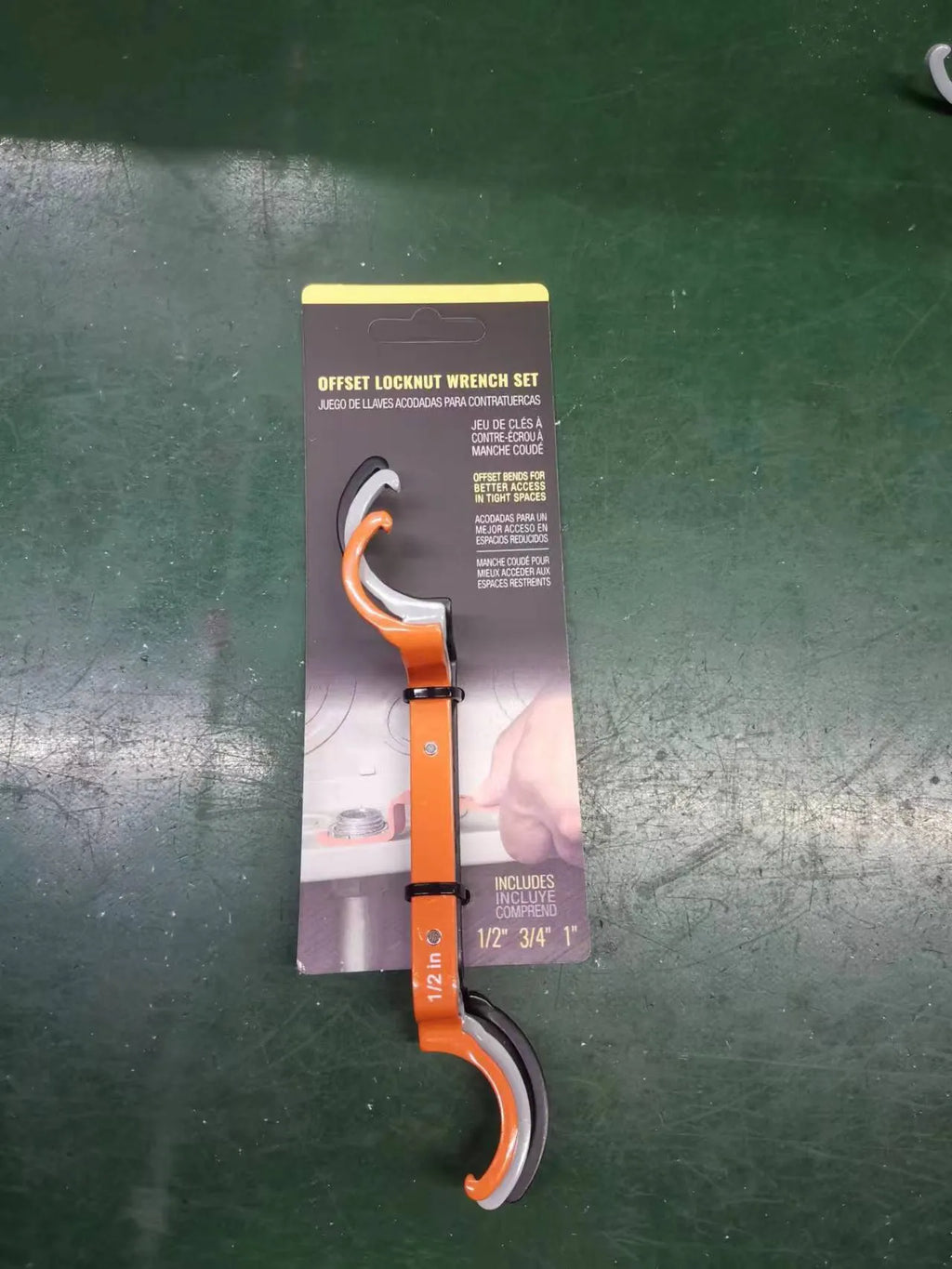 Crescent magnetic suction wrench set showing orange, grey, and black tools with catheter locking mechanism