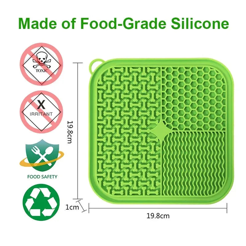 Square orange and grey silicone dog licking mat with textured surface and suction cups on back.