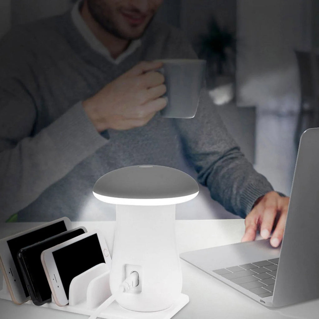 White mushroom-shaped USB charging station with 5 ports and LED lamp for desk organisation