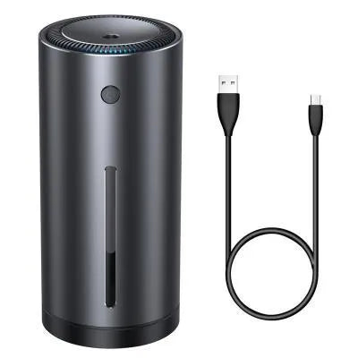 Black aluminium alloy car diffuser humidifier with air purification function on a desktop.