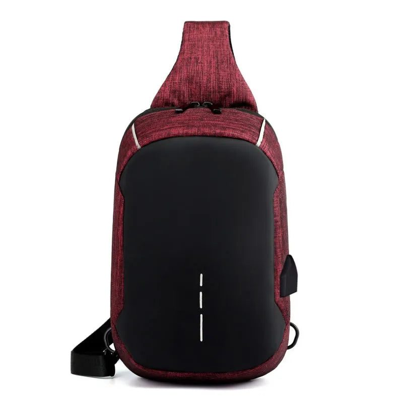 Small dark blue oxford cloth waterproof chest bag with a single strap and zipper.