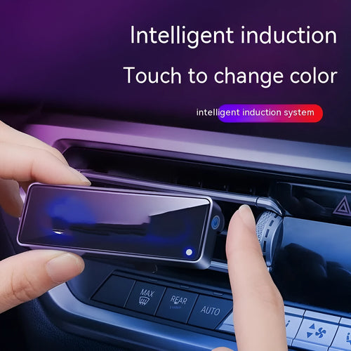 Black car air vent aromatherapy diffuser with LED light showing fragrance stick compartment