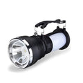 Black solar charging LED emergency flashlight with USB outlet for camping and outdoor use