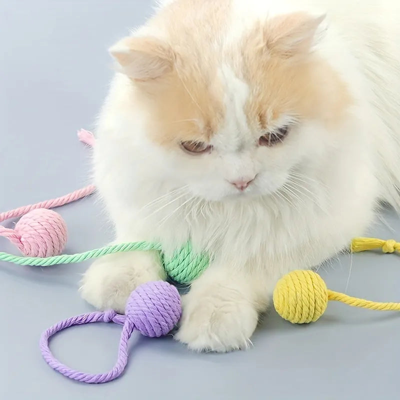 Colourful cat toy ball with rope handle and internal bell in 6cm or 3cm sizes