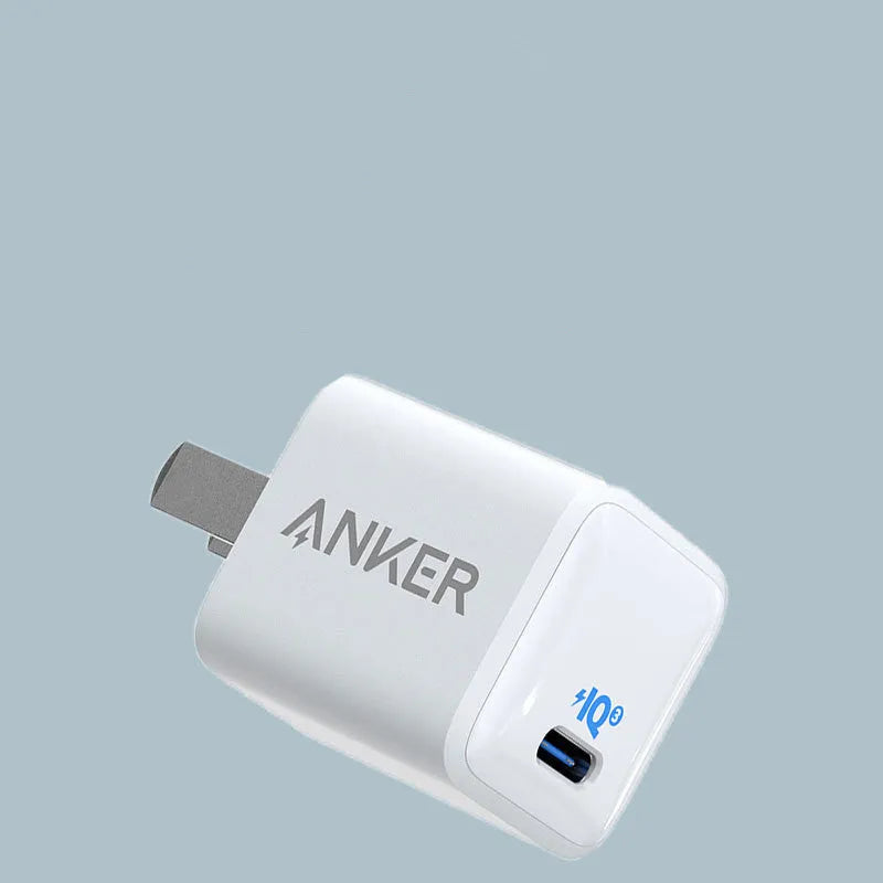 White USB travel charger with 18W power rating for mobile phone charging