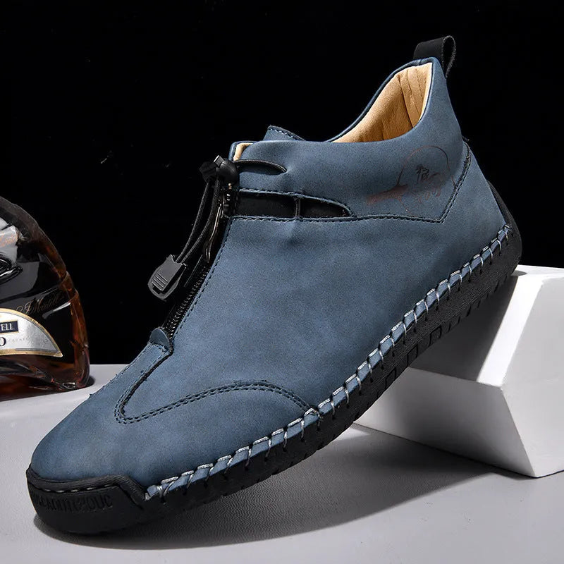 Men's black casual leather derby shoes with rubber sole and rounded toe.